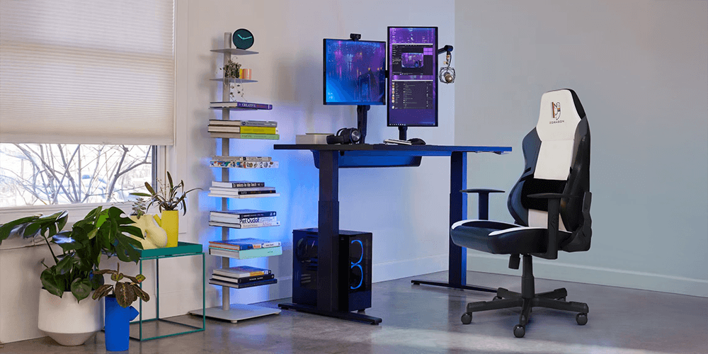 Ghế công thái học Gaming trang bị tay vịn linh hoạt hỗ trợ thao tác chuột và bàn phím